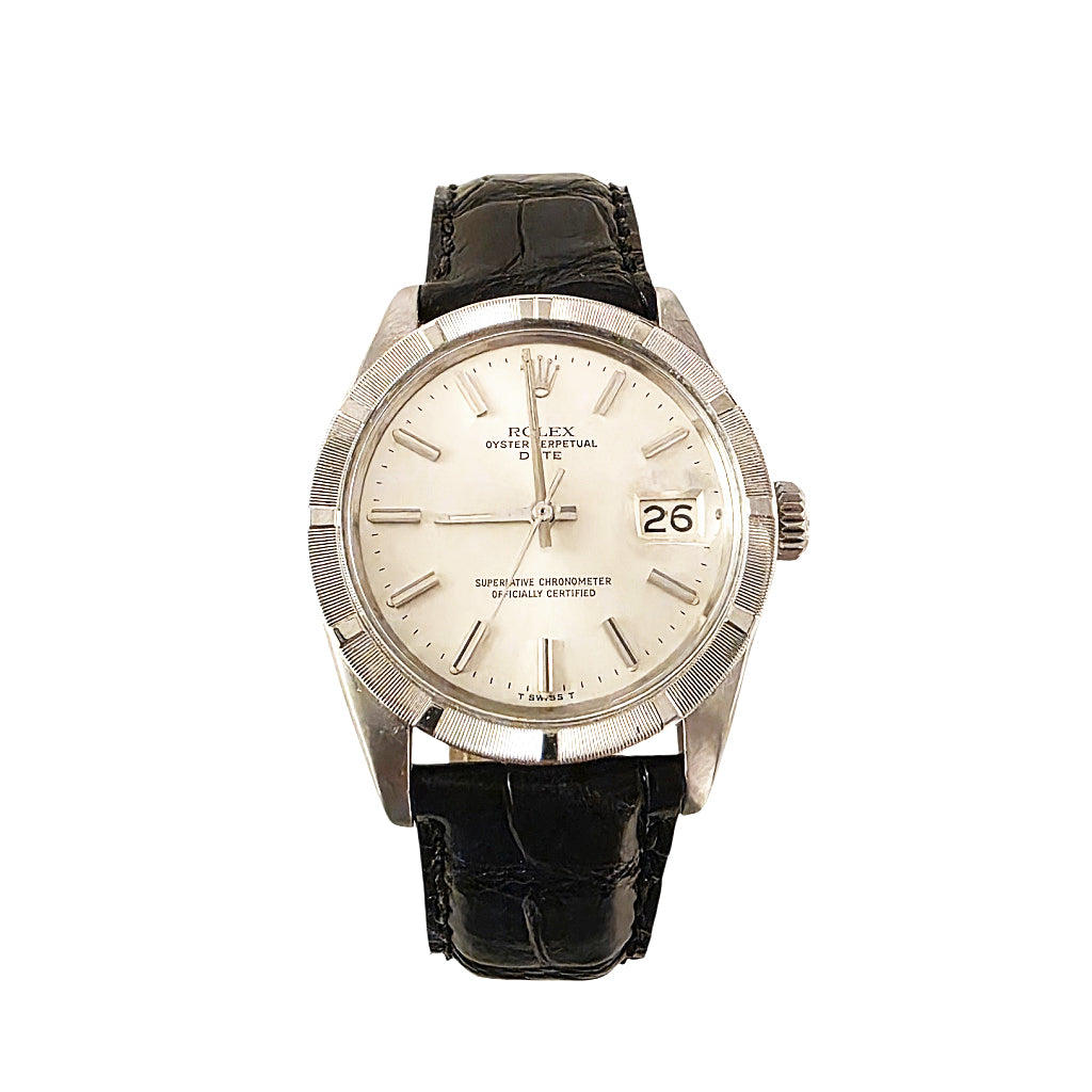 A vintage Rolex Oyster Chrometer watch with a silver-tone stainless steel case, cream-colored dial, and a black alligator leather strap, shown against a plain white background.