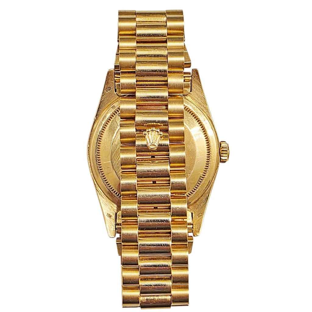 Rolex president with a matching link bracelet, shown from the back on a plain white background.