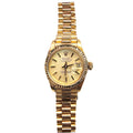 Rolex Datejust watch in yellow gold with a gold dial and a matching gold link bracelet, shown against a plain white background.