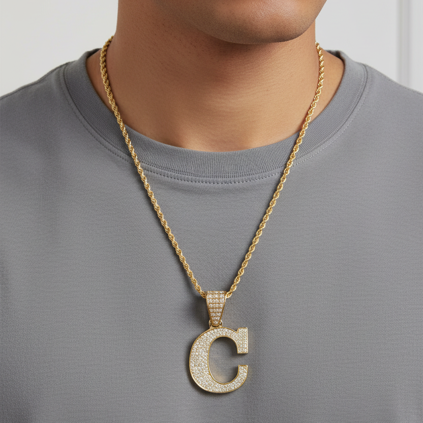 C pendant worn on a man's neck
