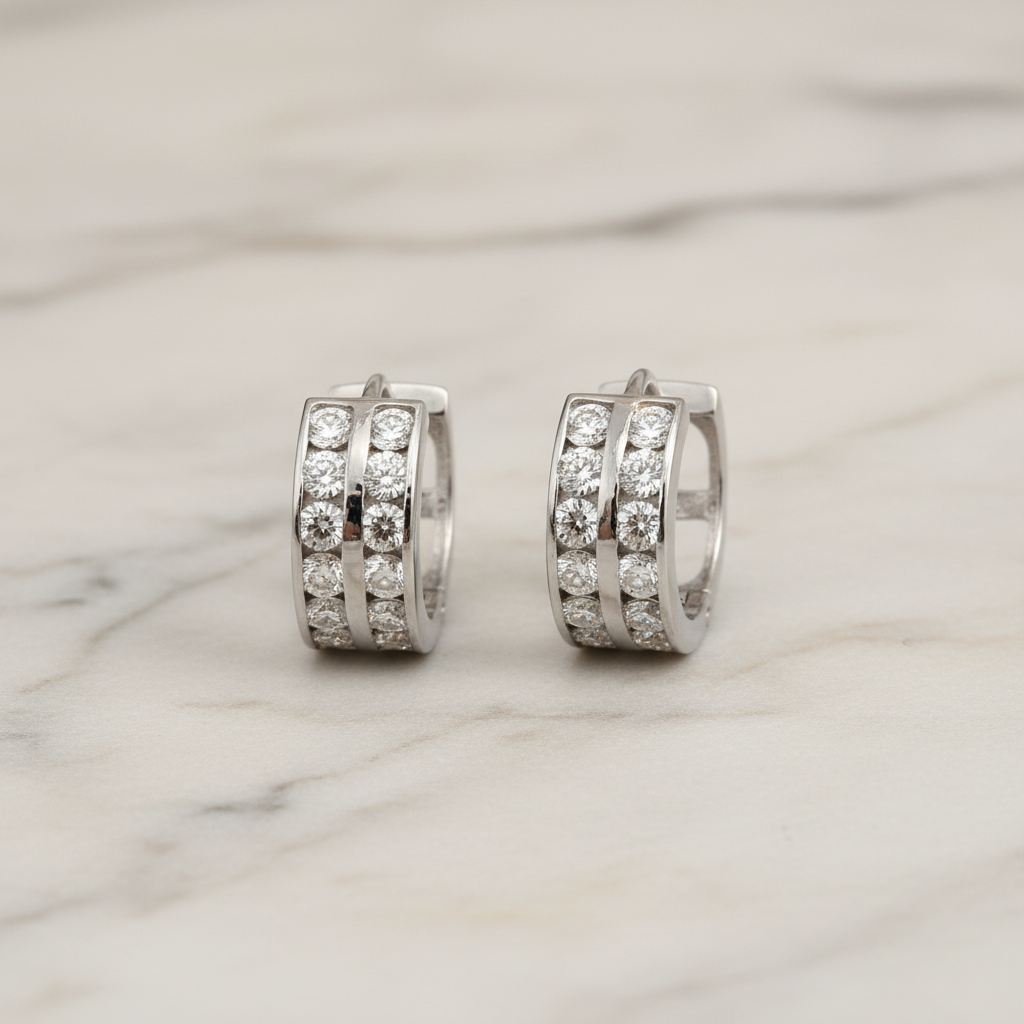 Diamond hoop earrings on marble