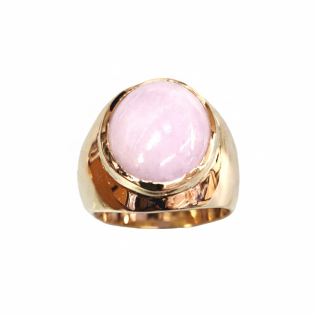 Enhanced gold ring with pink gemstone