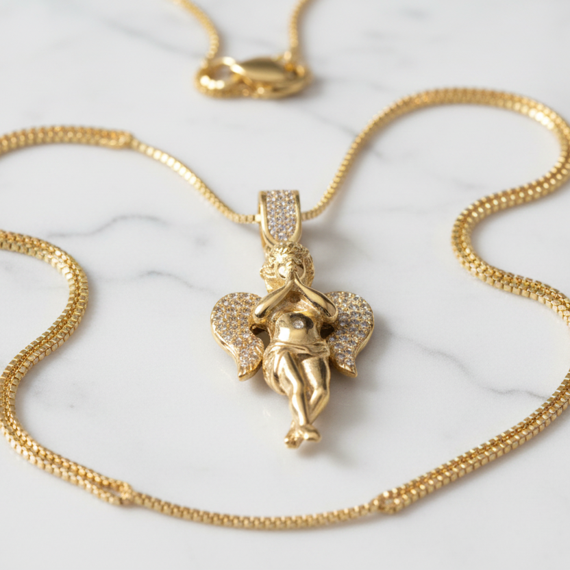 Gold Diamond Angel Pendant on Marble