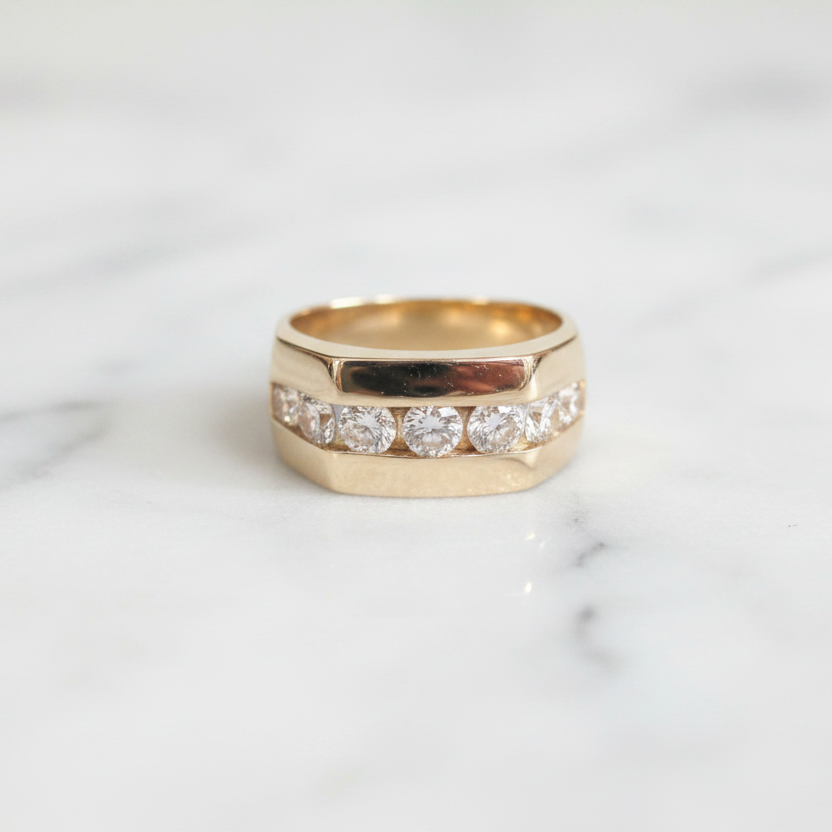 Gold Diamond Band Ring on Marble
