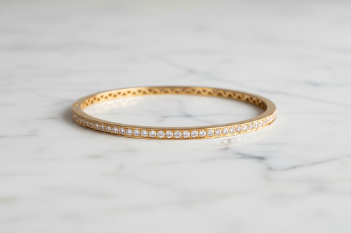 Gold Diamond Bangle on Marble