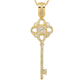 Gold Key Pendant on Marble