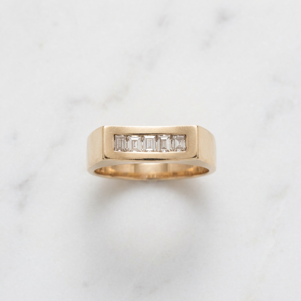Men’s ring on white marble