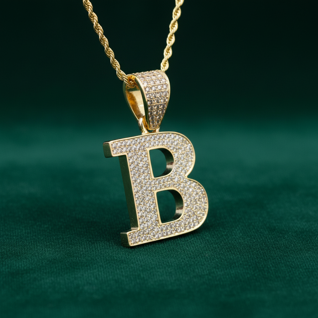 Solid B pendant on green velvet
