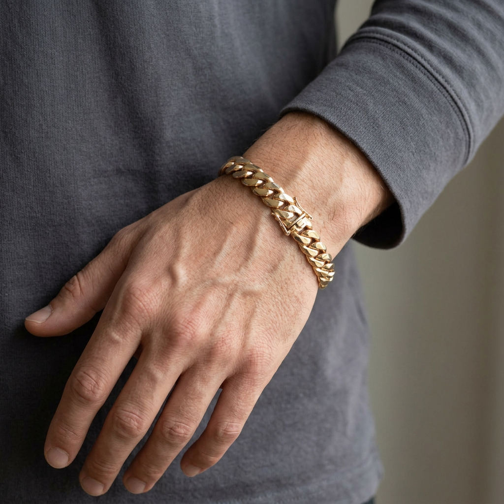 Zoomed-out men’s wrist shot with the yellow gold bracelet
